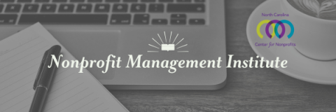 Close up of desk with lined notepad and pen, laptop keyboard, and white teacup. Text: Nonprofit Management Institute