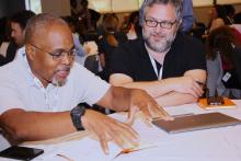 Two nonprofit leaders networking during a Center event.