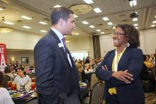 Two nonprofit leaders networking during a Center event.