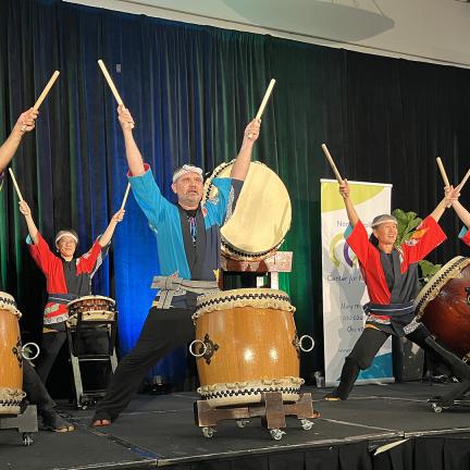 Triangle Taiko drummers performing during the closing session of the conference.
