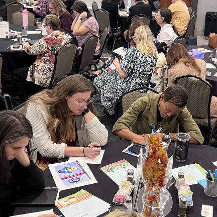 Engaged participants during a session at the conference.